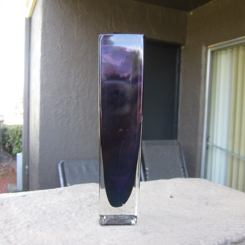 Small purple glass vase